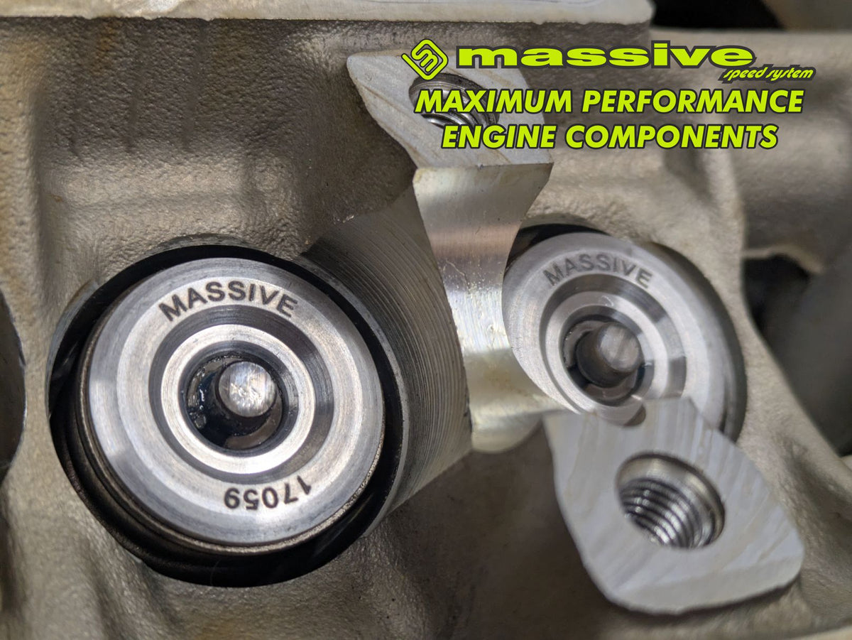 Massive Speed titanium retainer on a valve spring in a cylinder head, close up